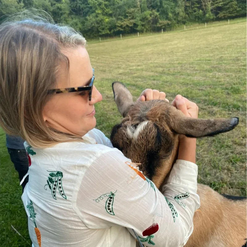 Devon Roeshot with one of the goats